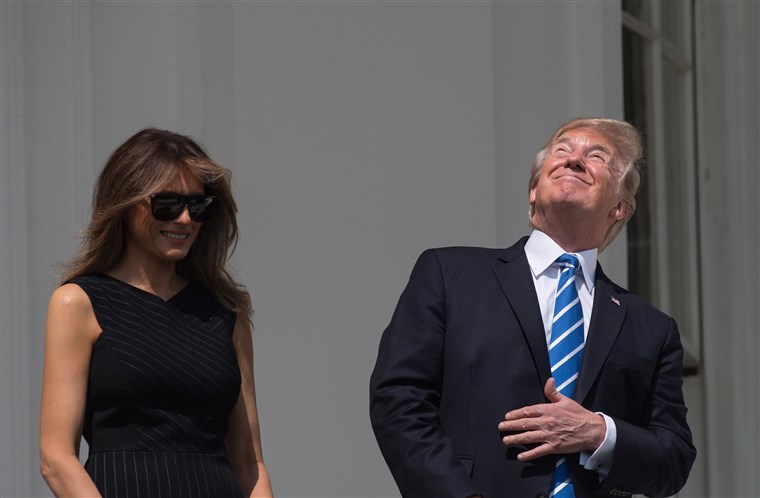 US President Donald Trump Looking Directly at the Eclipse