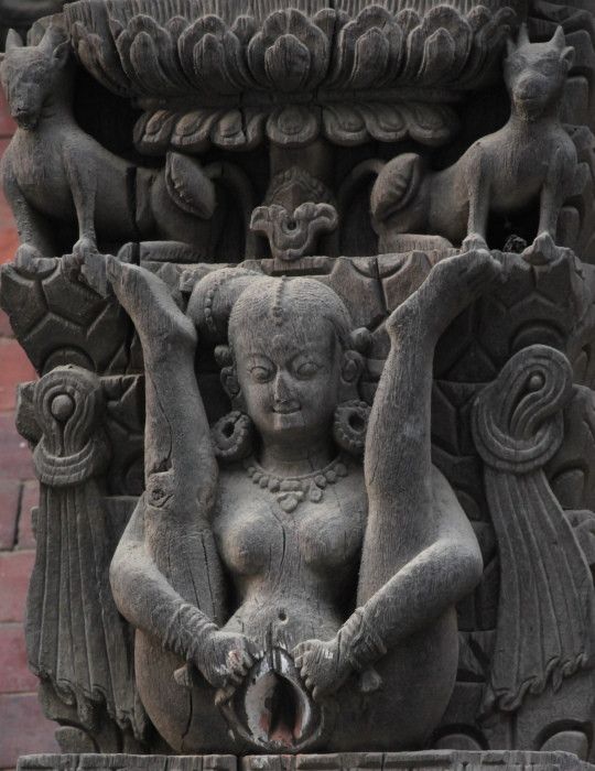 Hindu statue of woman spreading her vagina open.