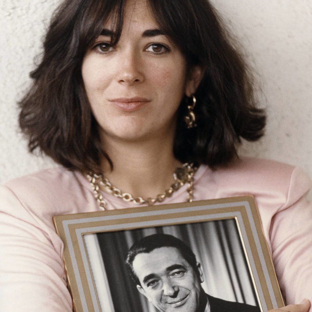 Ghislaine Maxwell holding a photograph of her late father, Robert Maxwell